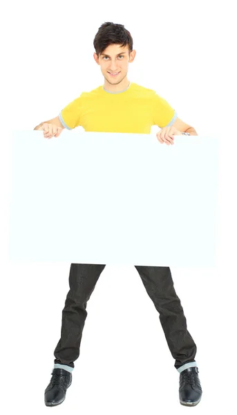 Portrait of a smiling young handsome man with blank banner — Stock Photo, Image