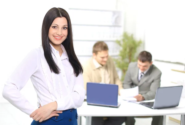 Nice business woman in the office. The conclusion of the transaction. — Stock Photo, Image