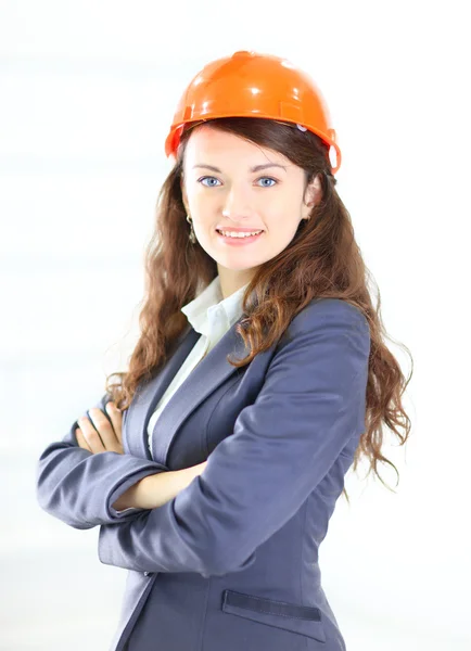 A bela mulher de negócios o engenheiro em um fundo branco — Fotografia de Stock