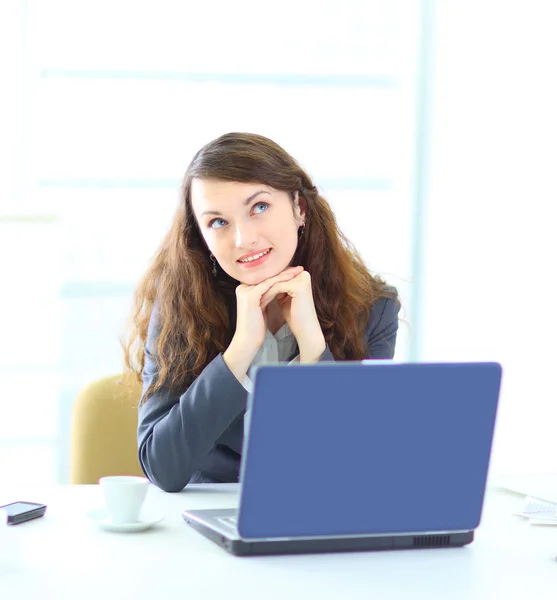 Young dreamy business woman, working with the laptop. — Stock Photo, Image