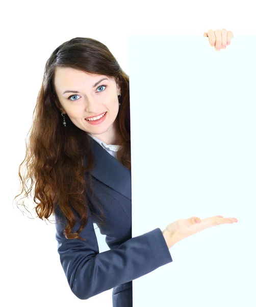 Mutlu gülümseyen genç iş kadını WHI izole boş tabela gösteriliyor — Stok fotoğraf