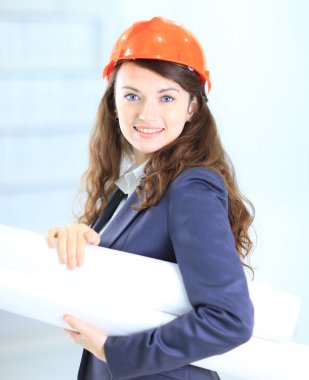 Beautiful businesswoman engineer with the work-plan office. clipart