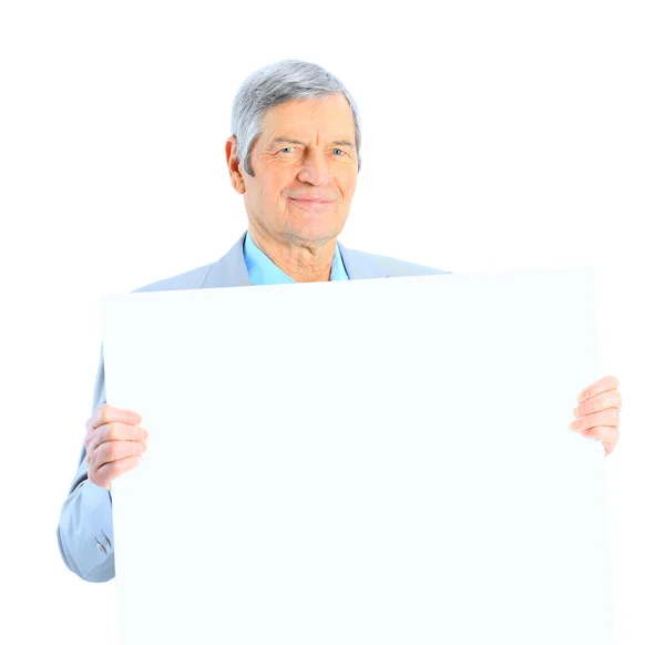 Ładne biznesmen w wieku posiada białe plakat. na białym tle na białym tle. — Zdjęcie stockowe