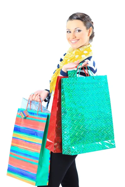 Portret van een gelukkig jong volwassen meisje, met kleurgecodeerde tassen. — Stockfoto
