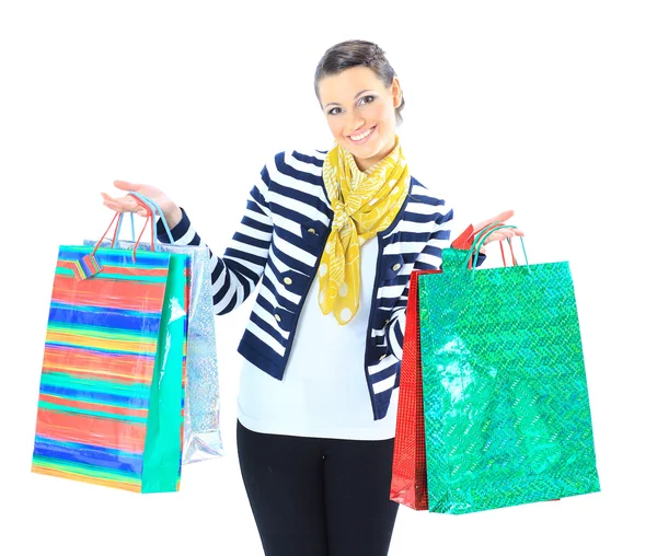 Portrait of a happy young adult girl, with color-coded bags. — Stock Photo, Image