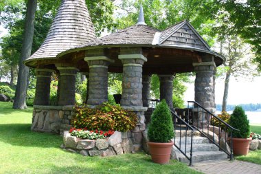 Old stone garden gazebo clipart