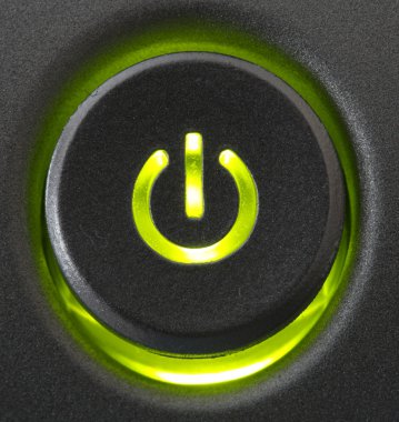 Lit up power on push button clipart