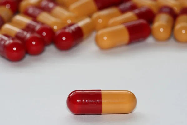 Close up of single drug capsule — Stock Photo, Image