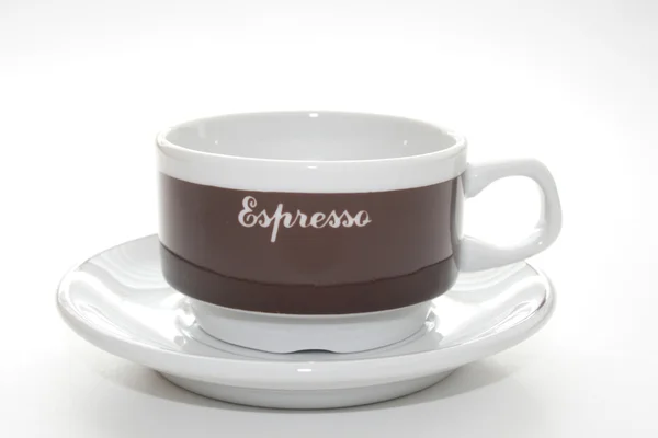Taza de café expreso y platillo de cerca — Foto de Stock