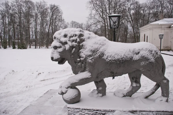 stock image Historical and snowy lion sculpture