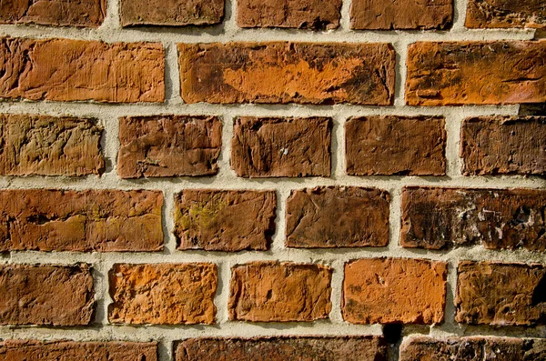 Parede de tijolos vermelhos antigos — Fotografia de Stock