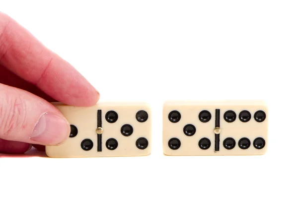 Isolated two domino bone and fingers — Stock Photo, Image