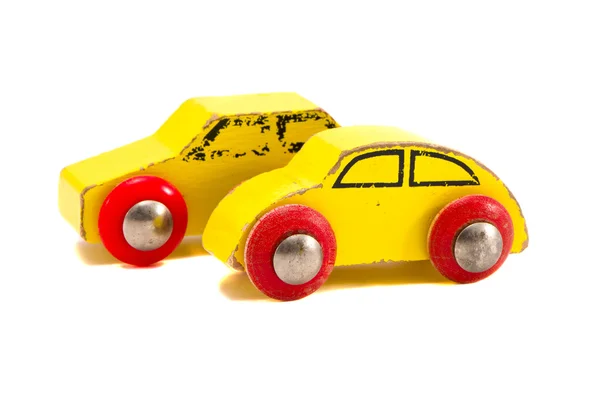 Geïsoleerde twee oude houten auto's speelgoed — Stockfoto