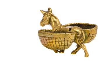 Isolated brass burro with baskets clipart