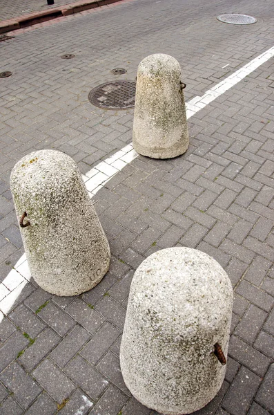 Concrete bollards in the old town — Stock Photo, Image