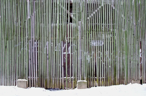 Bygga vägg bakgrund på vintern — Stockfoto