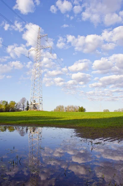 Spring landscape with utility pole — Stock Photo, Image