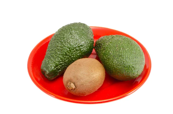 Isolated plate with avocado and kiwi fruit — Stock Photo, Image