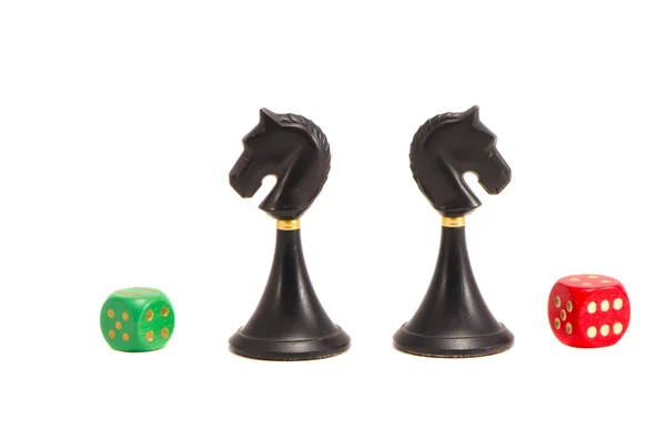Isolated two chess black knightes and dices — Stock Photo, Image
