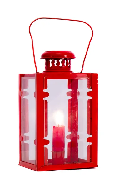 Isolierte rote Lampe mit Kerze — Stockfoto