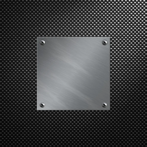 Placa de alumínio escovado aparafusada a um fundo de fibra de carbono — Fotografia de Stock