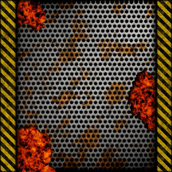 Perforated metal background with holes, rust and warning stripes over fire, hot lava or melted metal0 — Stock fotografie