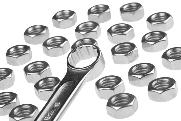 Spanner and nuts — Stock Photo, Image