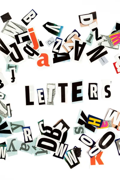 Letters inscription made with cut out letters — Stock Photo, Image