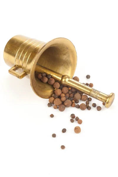 Overturned mortar with spices — Stock Photo, Image