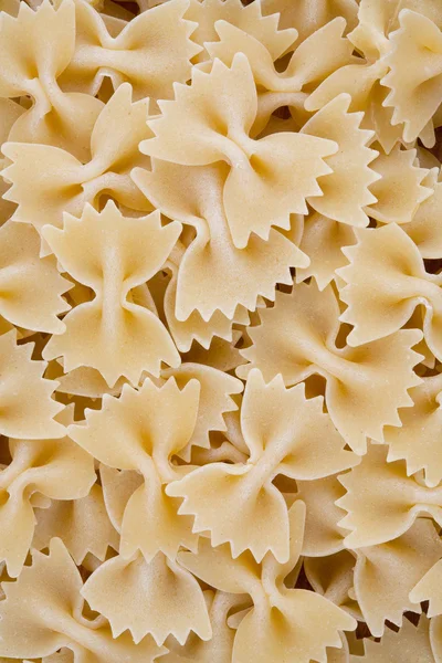 Close-up of raw farfalle pasta — Stock Photo, Image