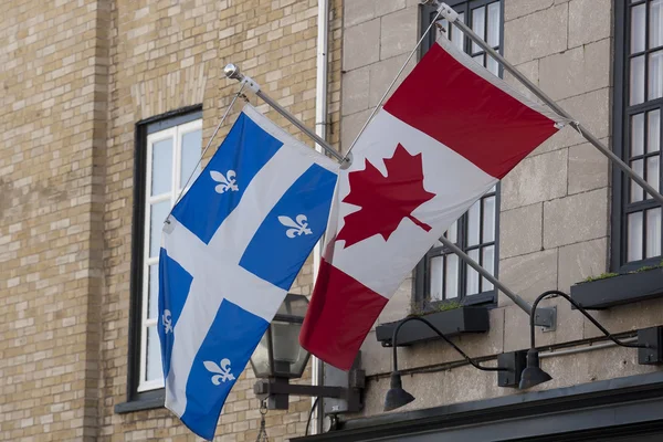 Vlajky quebec a Kanady — Stock fotografie