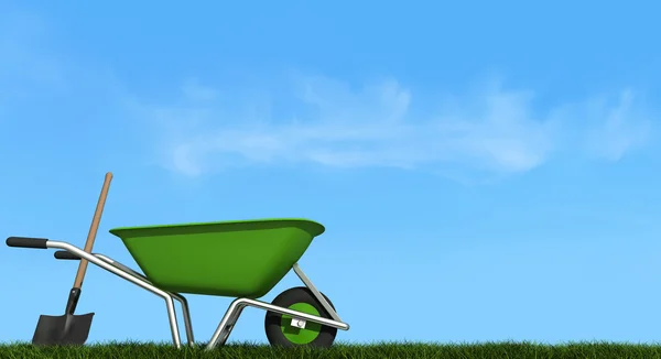 Wheelbarrow and shovel on grass — Stock Photo, Image