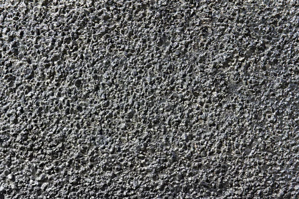 Background of small stones filled with bitumen — 图库照片