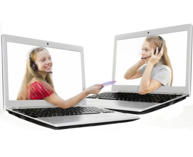 Girl from notebook giving a disc to girl of other notebook clipart