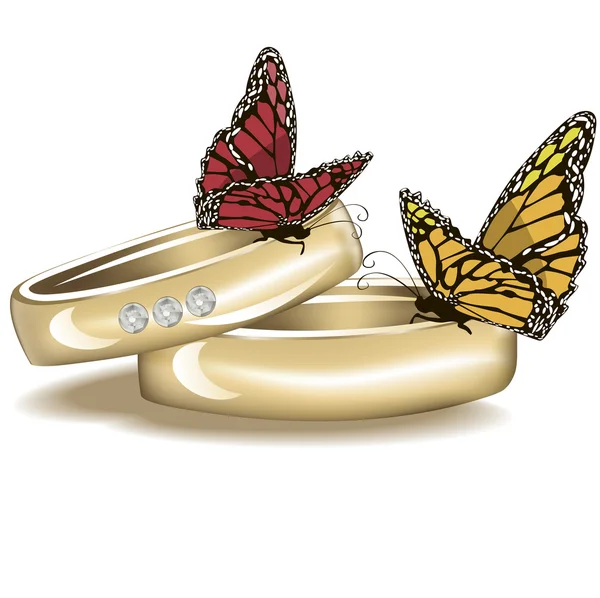 Anéis de casamento com borboletas isoladas em branco — Fotografia de Stock