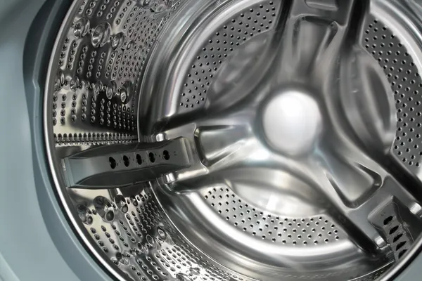 Stainless steel drum washing machine. Royalty Free Stock Photos