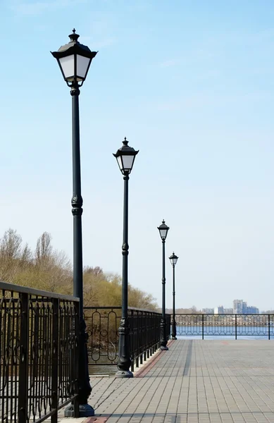 stock image Lights and a paved walkway gray tiles