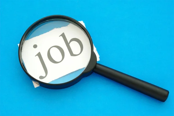 stock image Magnifying glass and a piece of paper