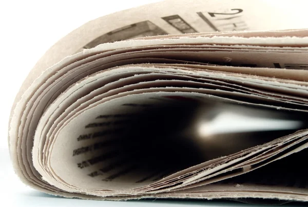 Newspaper on the table, side view, close-up — Stock Photo, Image