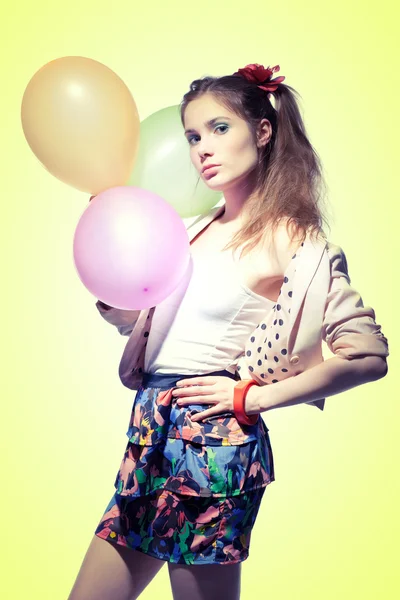 Flicka med ballonger — Stockfoto