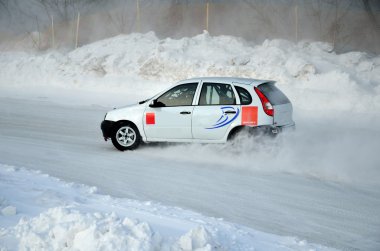 White car, adjustable skid on the icy track clipart