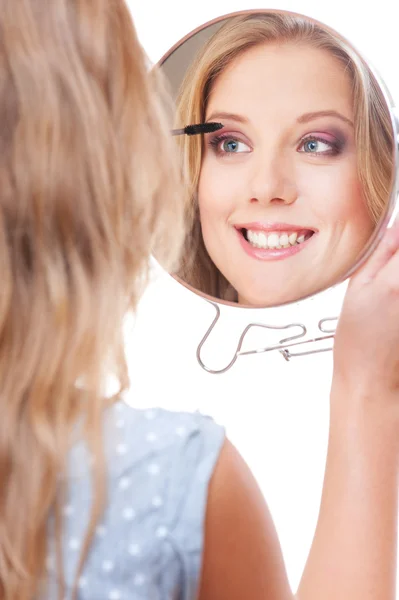 Studio picture of smiley young woman with miror — Stock Photo, Image