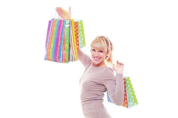 Studio shot of smiley woman after shopping — Stock Photo, Image