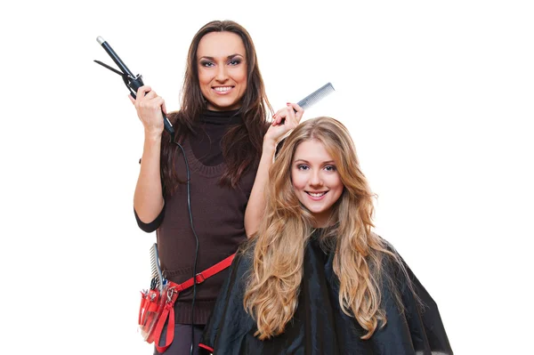 Studio shot of hairdresser and blonde woman — Stock Photo, Image