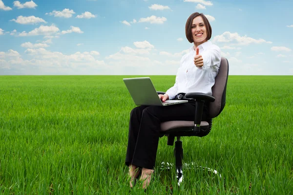 Smiley secretary on the field showing thumbs up — Stock Photo, Image