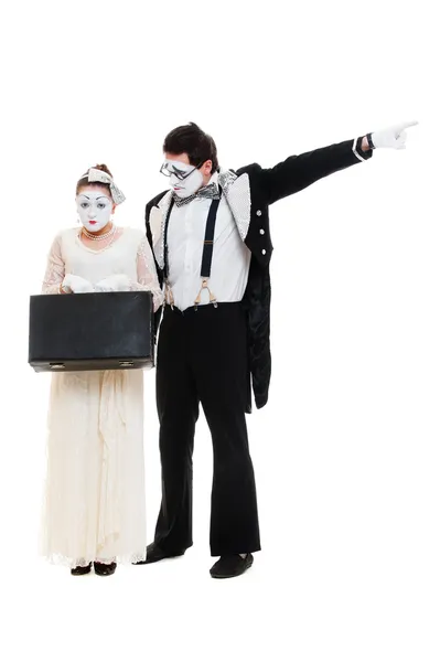 Studio shot of mimes with suitcase — Stock Photo, Image