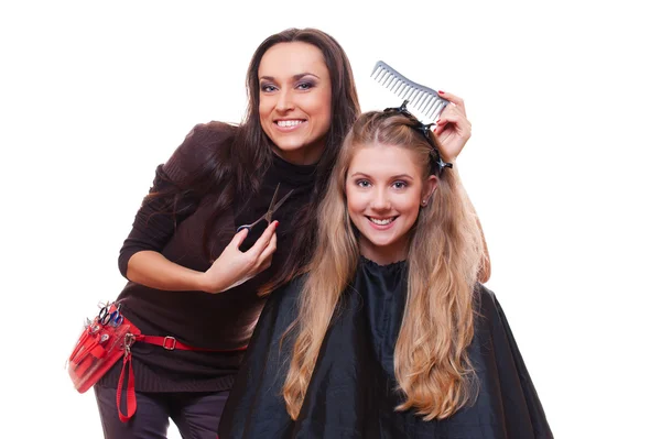Ung frisör och ung kvinna — Stockfoto
