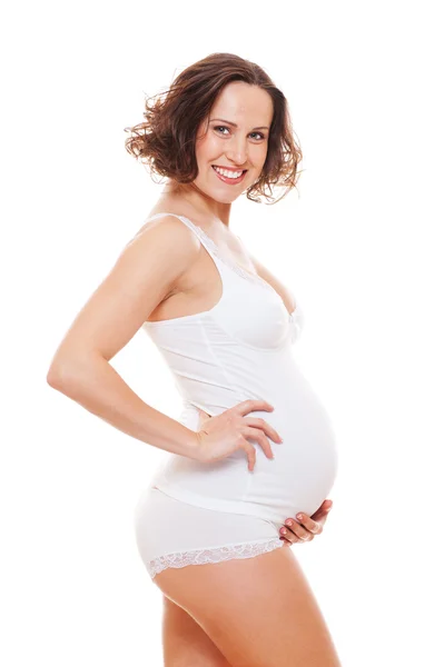 Donna incinta in lingerie bianca — Foto Stock