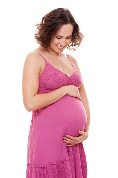 Zwangere vrouw in roze sundress — Stockfoto