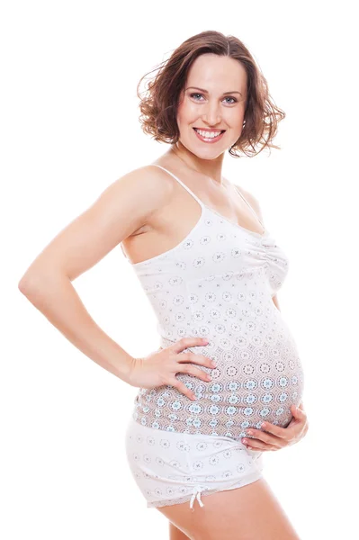 Gravid kvinna krama magen — Stockfoto